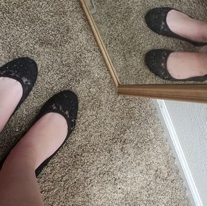 Worn Black Flats